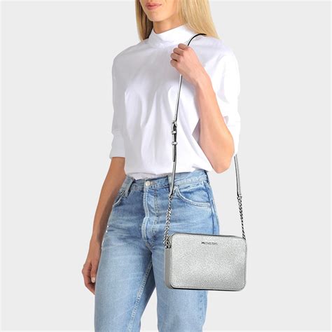 michael kors metallic purse recall|silver crossbody bag designer.